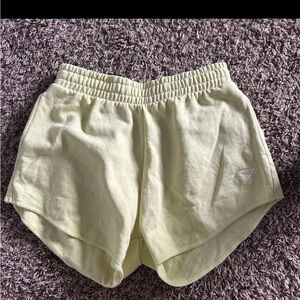 Gymshark Women's Pastel Yellow Athletic Shorts